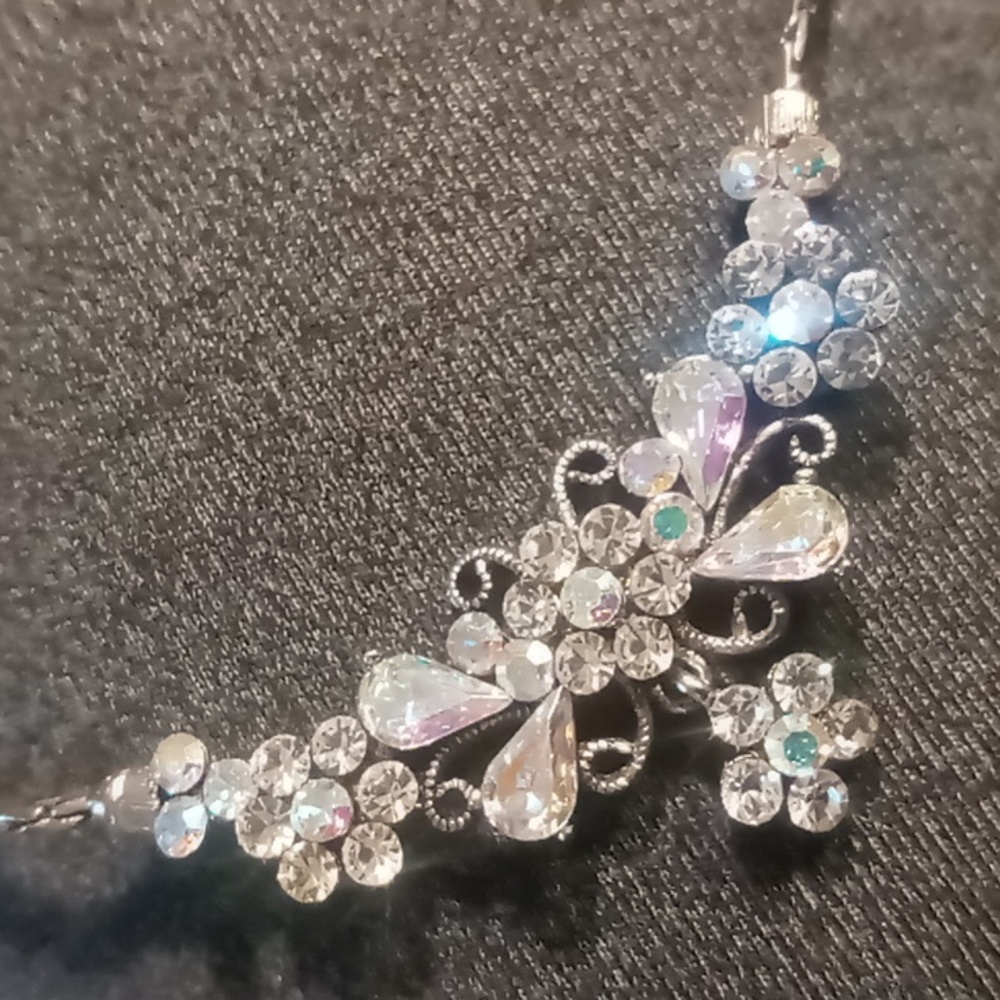 Rhinestone flowers & butterfly collar  necklace 16 inches long.